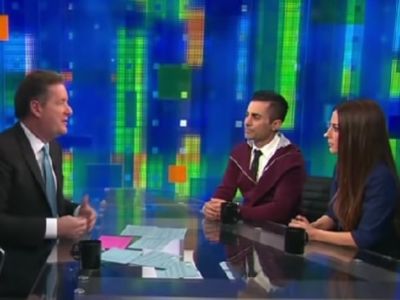 Mike and Kerri Kasem are sitting on one side and Piers Morgan is sitting opposite them as they are talking.